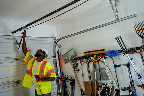 Professional Garage Door Panel Replacement technician working in Montgomery County County, VA